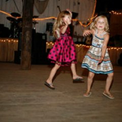 a little girl playing with a frisbee