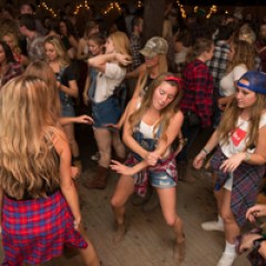a group of people standing in front of a crowd