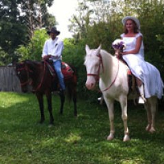a group of people riding on the back of a horse