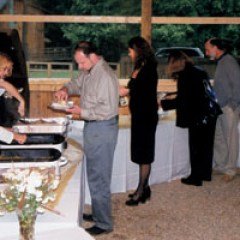 a group of people standing in front of a crowd