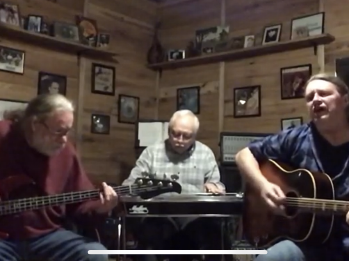 a man holding a guitar