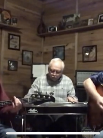 a man holding a guitar