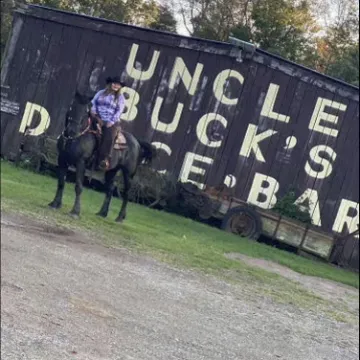 a group of people holding a sign