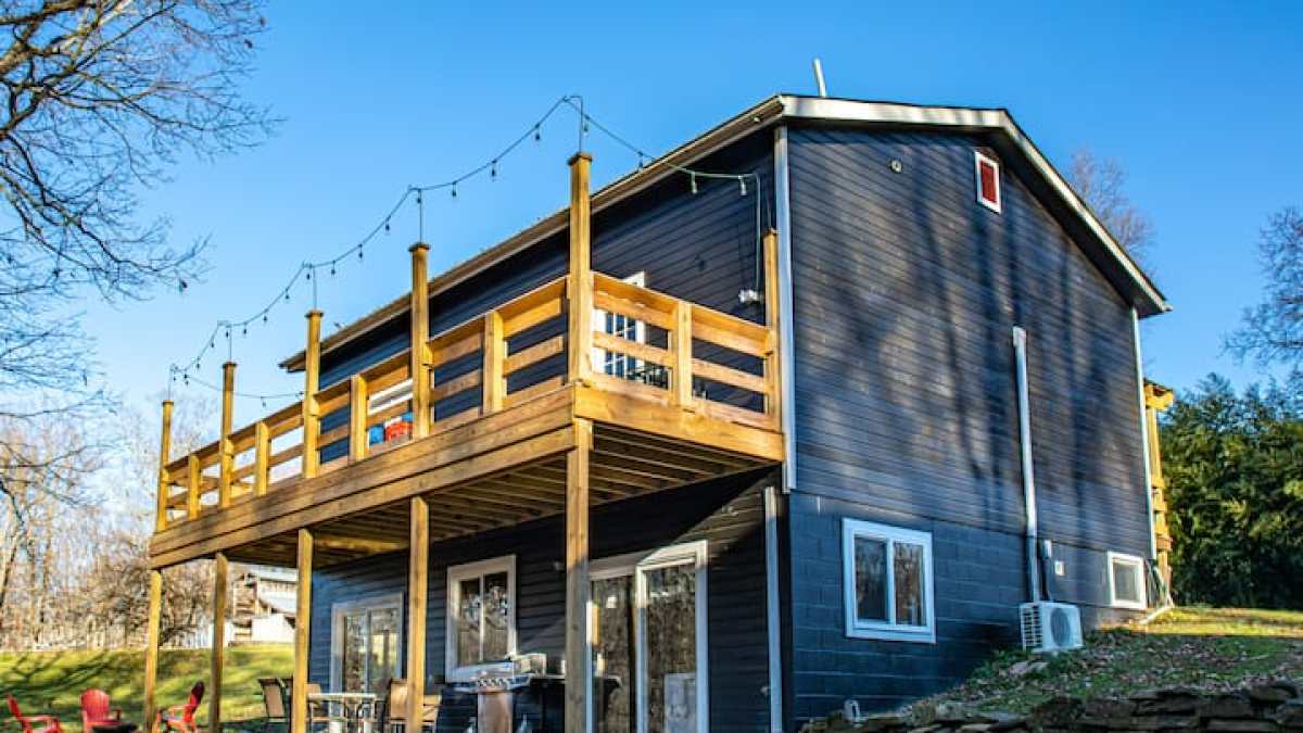 a sign in front of a house