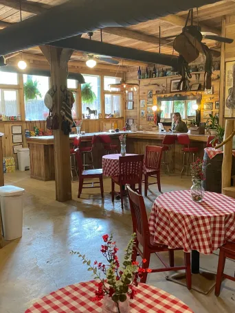 a dining room table in front of a building